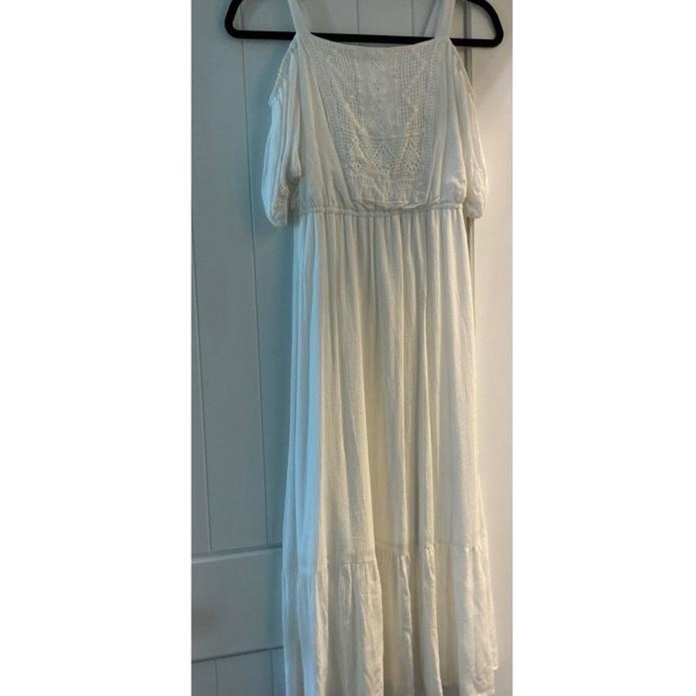 White long dress, off the shoulder with crochet design on front.